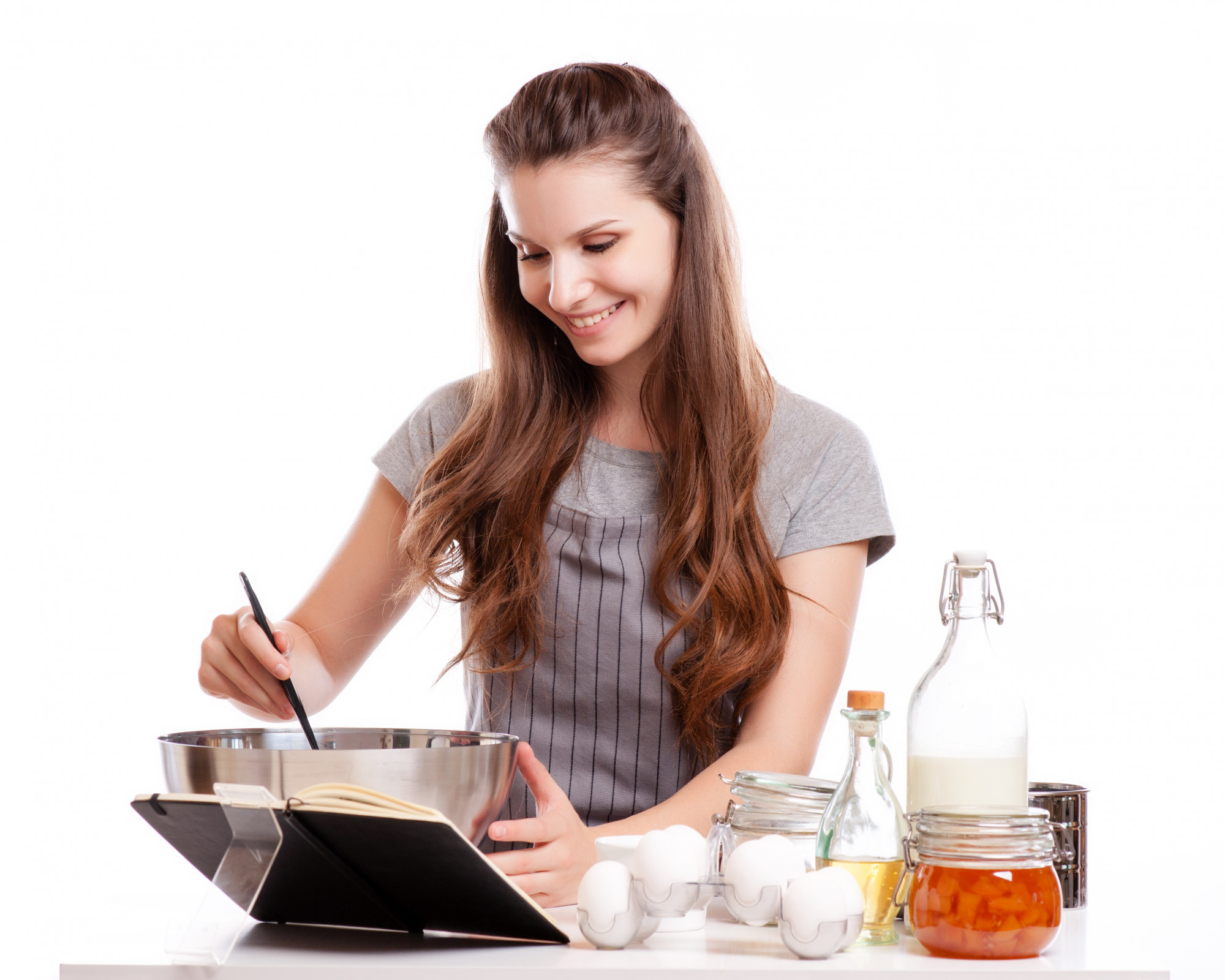 Student plating food during an online class
