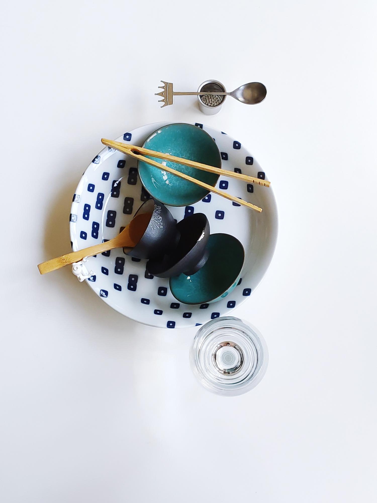 Course materials and plated dishes arranged on a table